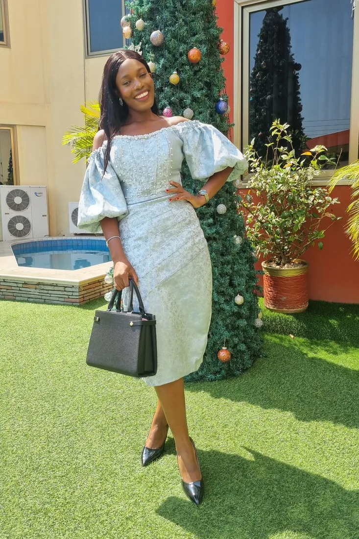 After. Wuenam Glory before and after: in a navy dress with red and white trim beside a pool, and in a pale blue embellished off-shoulder dress beside a decorated Christmas tree.